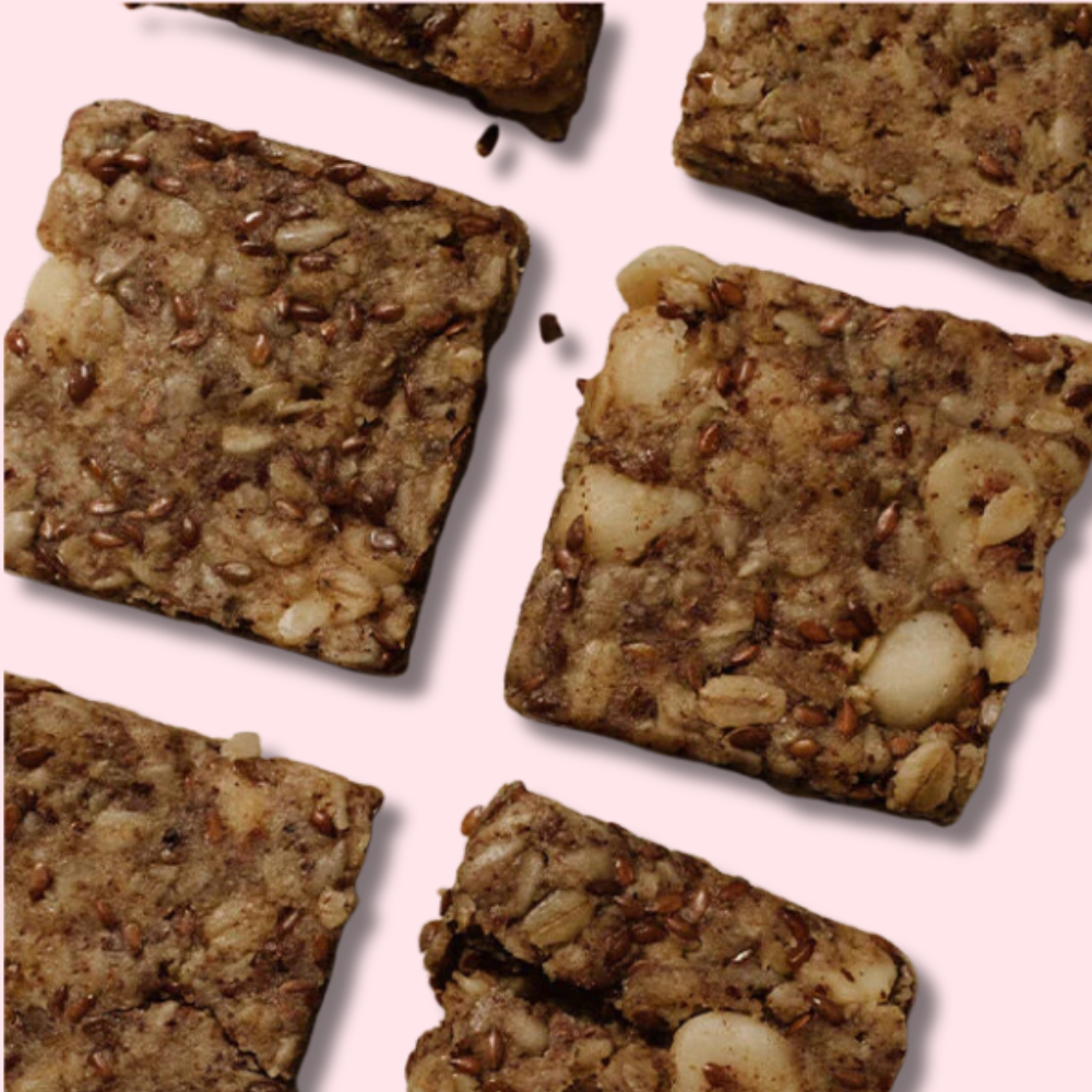 Snack Vanifique avec boîte d’emballage écoresponsable, sans gluten, parfait pour soutenir la croissance fœtale et le bien-être des futures mamans.