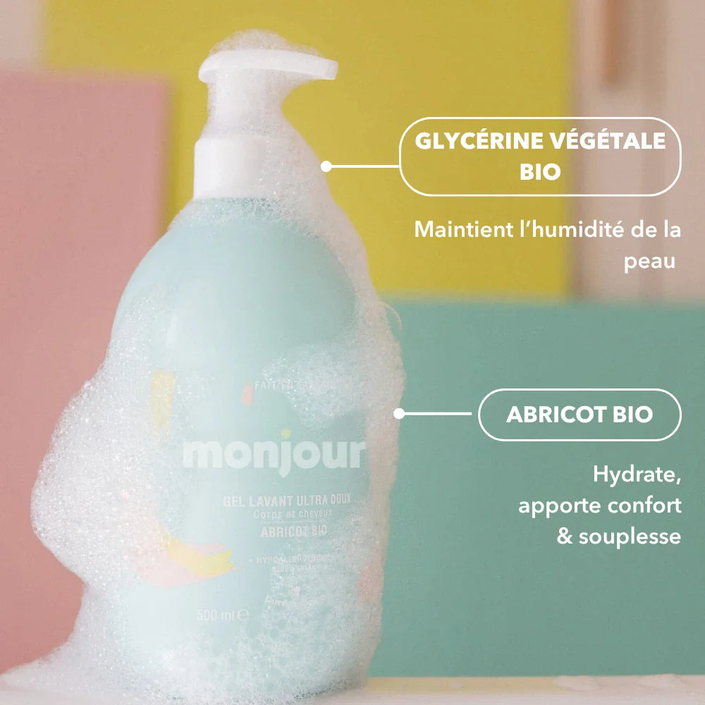 Flacon de gel lavant Monjour entouré de mousse, avec mise en avant de la glycérine végétale bio et de l’abricot bio hydratant.