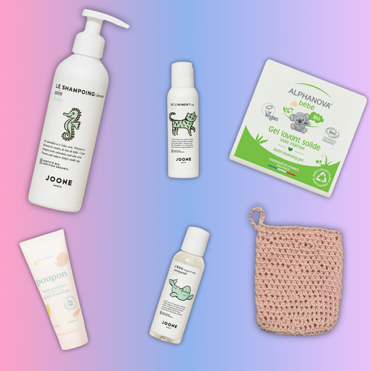 mage de la Box Bébé Naissance contenant des produits essentiels pour les premiers jours de bébé : liniment Joone, shampoing croûte de lait, savon surgras Alphanova, eau nettoyante, mini crème hydratante Monjour et lingette lavable 
