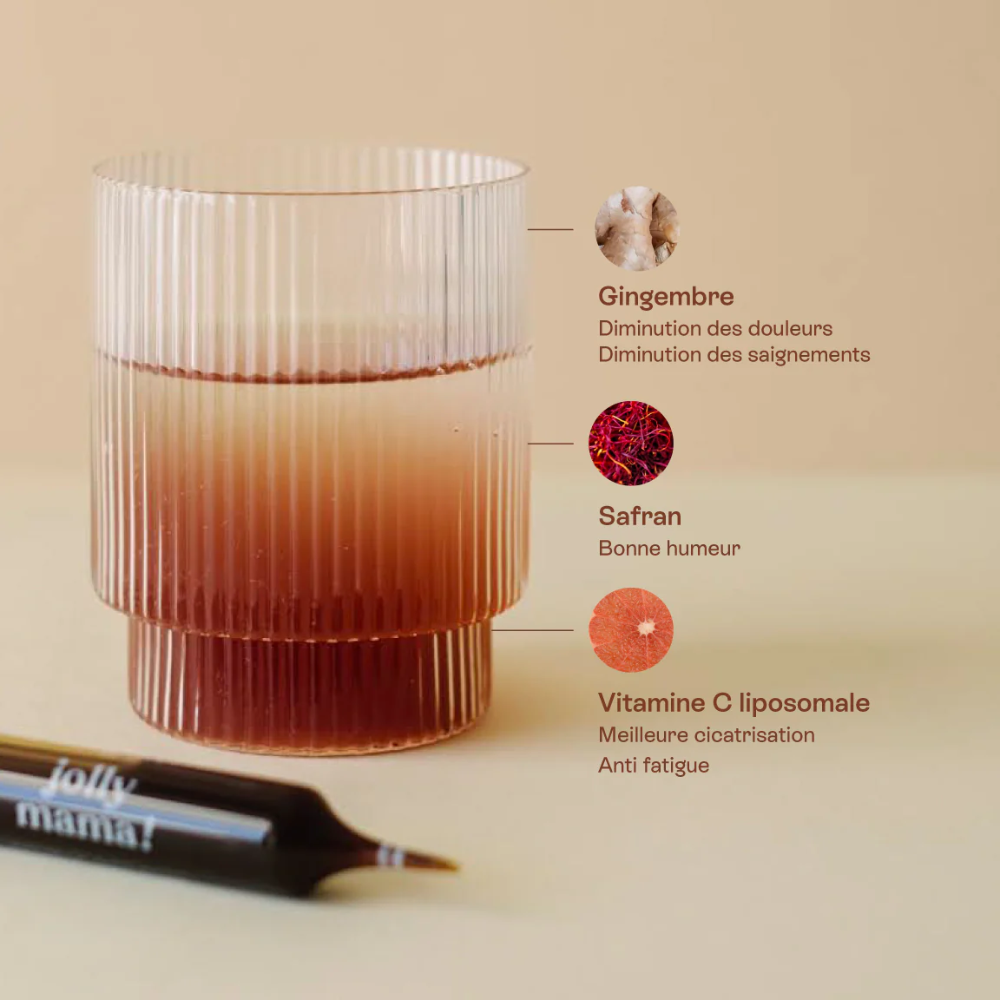 Gros plan sur racine de gingembre et pistils de safran, actifs reconnus pour apaiser les douleurs post-accouchement et soutenir l’humeur des jeunes mamans.