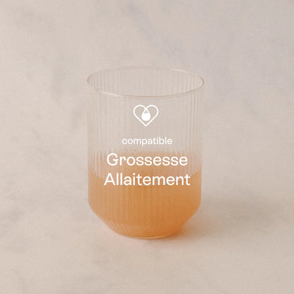 Ampoule diluée dans un verre d’eau avec mention “compatible grossesse et allaitement”.