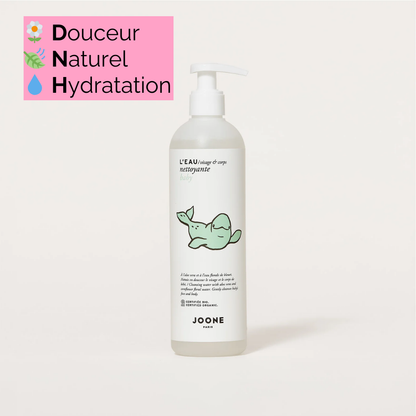 Eau Nettoyante Joone pour le visage et le corps, présentant le flacon en gros plan sur fond rose, soulignant ses ingrédients naturels.