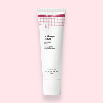 Tube de Masque Repulp Novexpert sur fond rose.