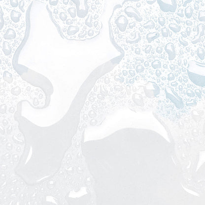 La texture légère et non grasse de la lotion Mon Coup de Pousse, facilement absorbée par le cuir chevelu.